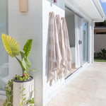 Luxe Finn Stripe pool towel in beige by Pandanus & Palm