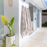 Luxe Finn Stripe pool towel in beige by Pandanus & Palm