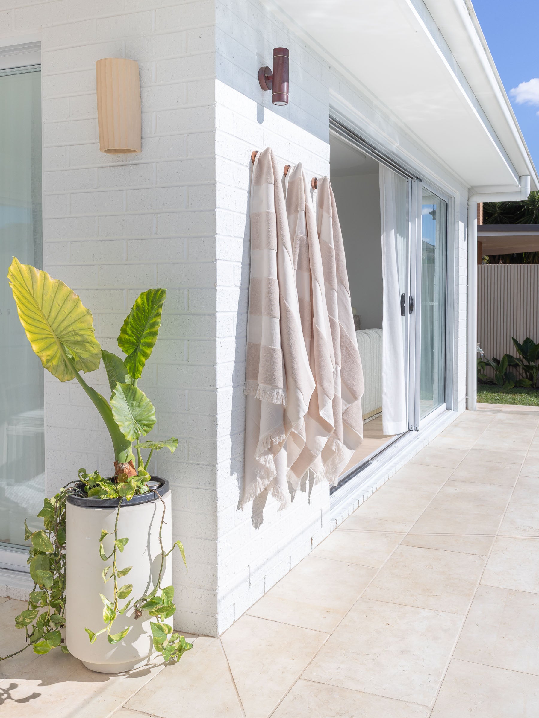 Luxe Finn Stripe pool towel in beige by Pandanus & Palm