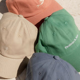Pandanus & Palm Mermaid Cap in coral cotton twill