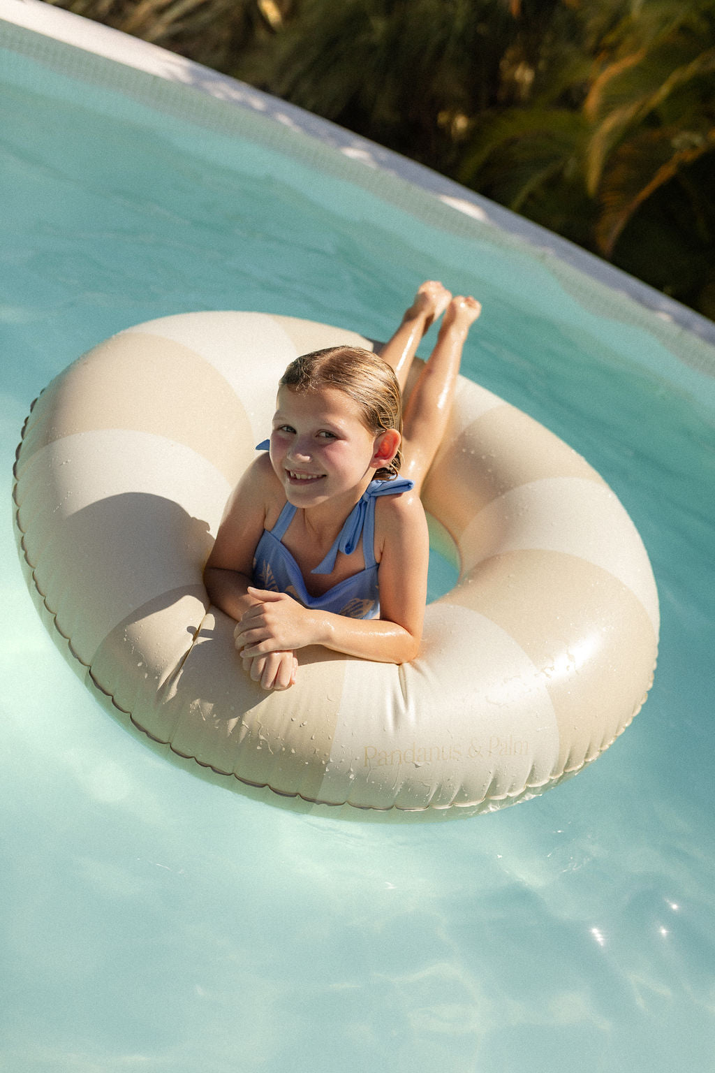 Harper pool swim ring in beige by Pandanus & Palm